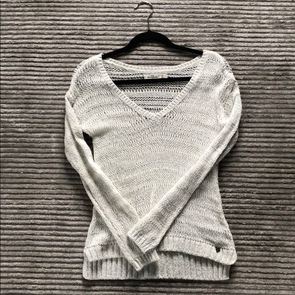 light gray and silver sweater